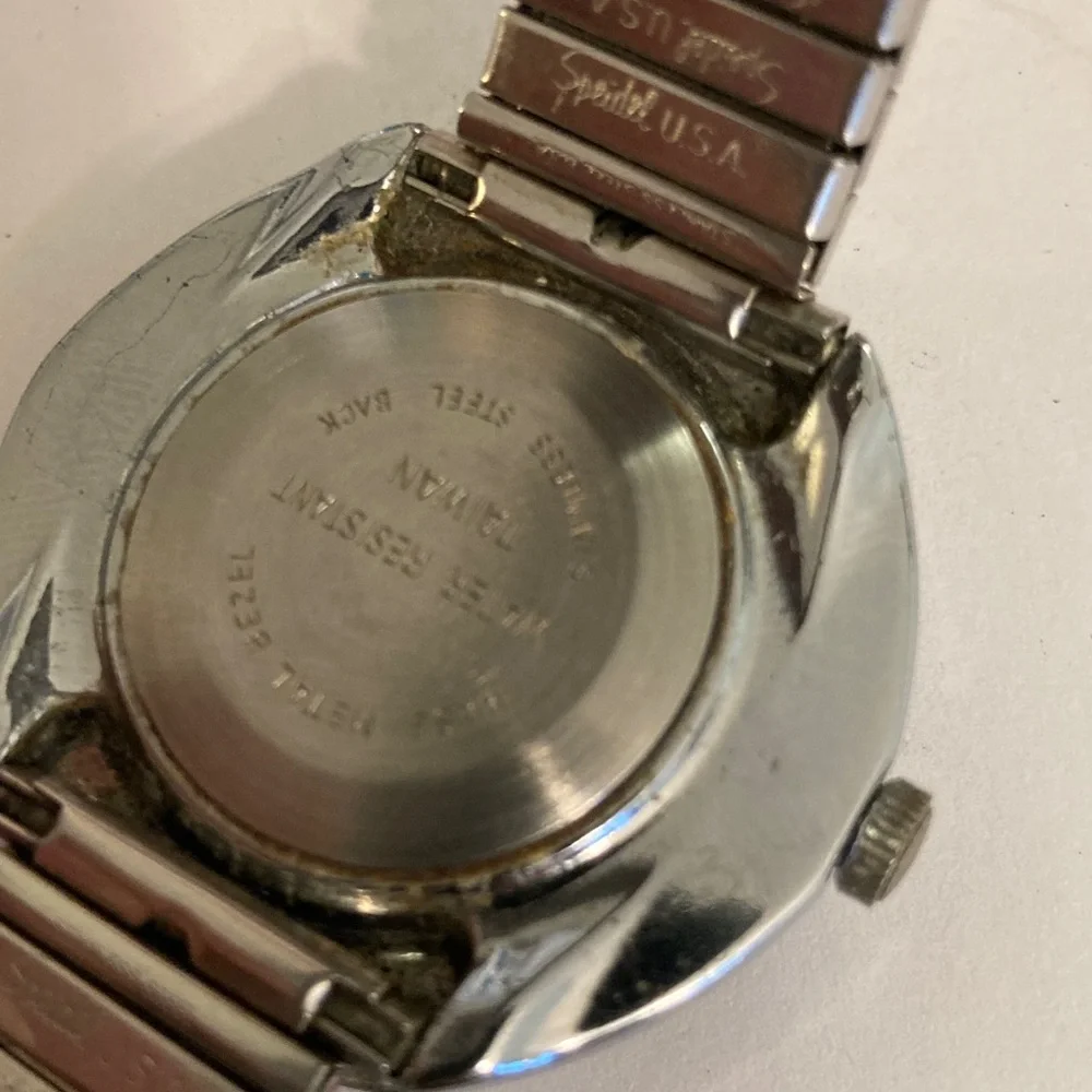 Vintage Timex watch, black dial, domed crystal, 2 straps, 1 leather, 1 stainless
